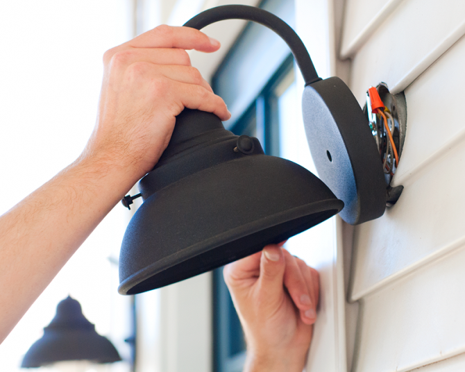 How To Install An Exterior Lighting Fixture Angie S List Secure Exterior Lighting Fixture To Wall